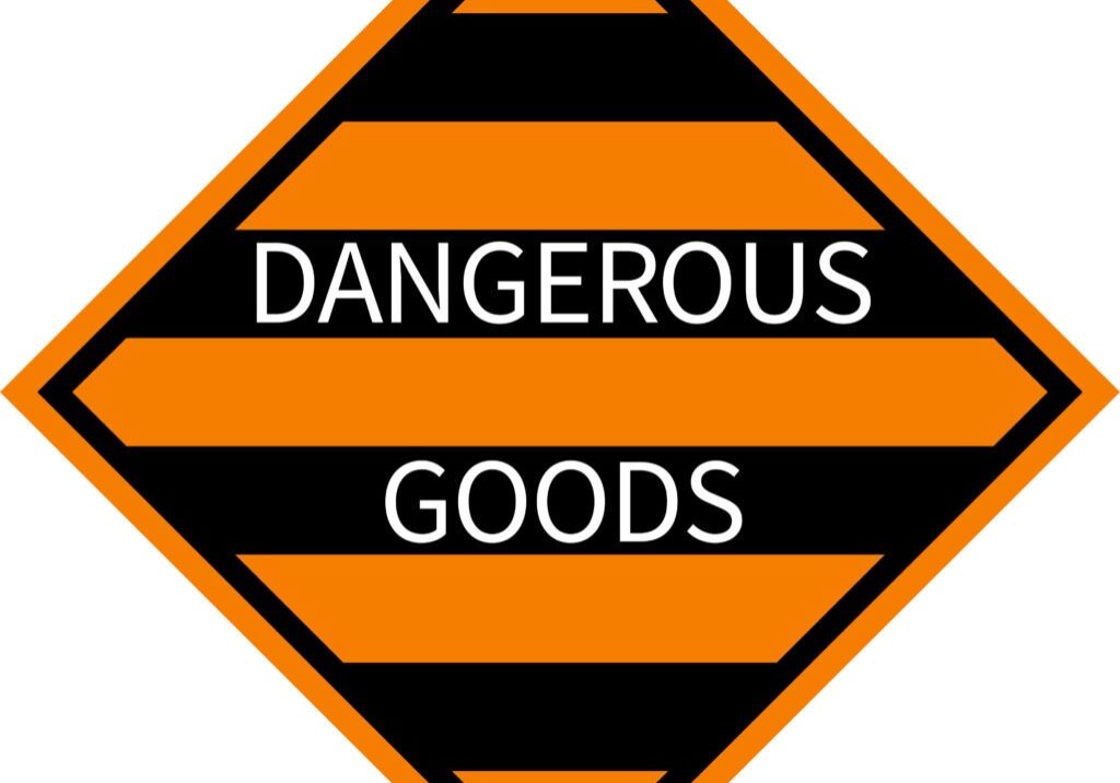 Dangerous goods sign. Black, orange stripes background. Labels and placards.